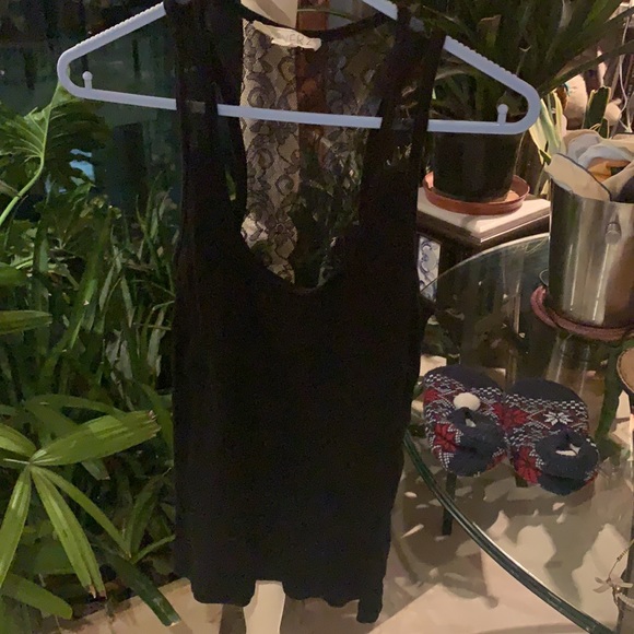 Forever 21 Tops - FOREVER 21 black sleeveless tee. Lace detail on the back. Size S.